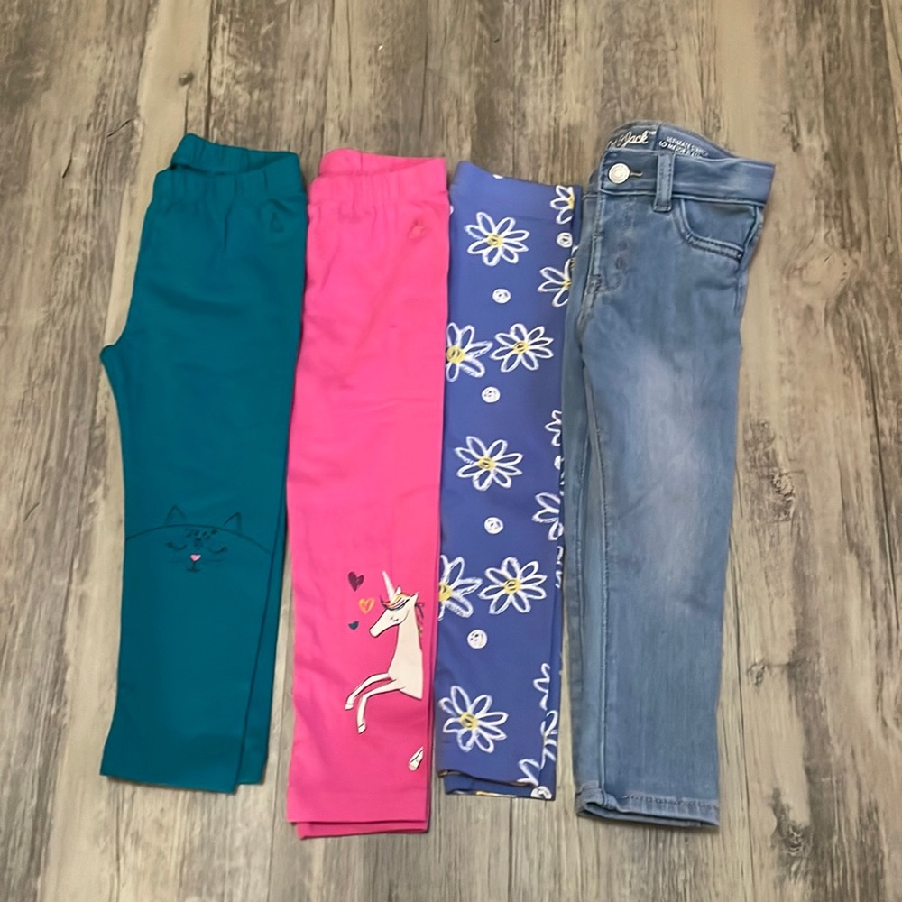 Three pattern leggings and one pair of jeans all 2T. Gap and Carters